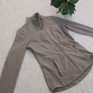 Tan workout/running jacket size SMALL